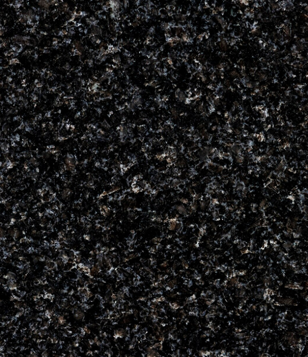 Close-up of a dark, speckled granite surface with black, gray, and brown tones.